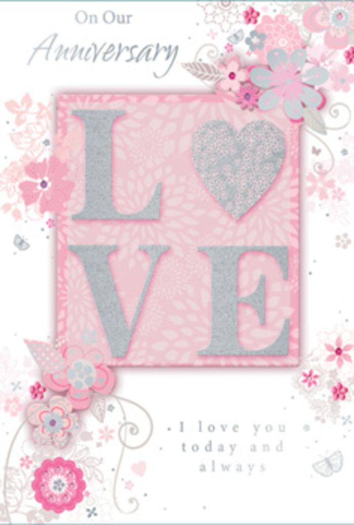 Laid open as if ready to be tucked beside a bouquet on a West Norwood doorstep, this anniversary card glows with understated romance. At its heart, the word LOVE rises from the surface in embossed letters, edged with frosted glitter that catches the light in a soft, playful way, similar to how petals gleam under streetlamps near West Norwood station on a clear night. The central lettering panel is a warm blush pink, gently framed by an aura of pearly white and quiet grey, creating a dreamy, luminous effect. Surrounding this central word, wispy, hand-drawn blooms and soft sprays trace their way around the card. Their petals, shaded in tones of blush, lilac-pink, and ivory, blend harmoniously like mixed stems in a carefully composed anniversary bouquet. Slender tendrils of leaves and curving lines twist and loop, resembling the natural flow of foliage as it weaves through a hand-tied arrangement. Small, almost-hidden butterflies and delicate flourishes add a feather-light sense of motion, as though a breeze has just brushed through an open florist's door along Norwood High Street. The message I love you today and always appears in understated, graceful type, positioned so it feels gently cradled within the floral swirl rather than simply printed over it. Subtle hints of silver shimmer among the petals and vines, adding a touch of celebration without overwhelming the soft, romantic palette. The card's overall effect is that of a quiet, sunlit room where love is honoured every day-a paper bouquet that pairs perfectly with fresh anniversary flowers delivered throughout West Norwood to mark a bond that endures and deepens over time.