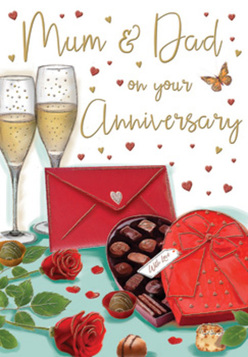 The anniversary card imagery feels like a lovingly arranged still-life, as if set on a polished table in a West Norwood home just before a special toast to "Mum & Dad." Dominating the scene are two elegant champagne flutes, filled with sparkling, golden liquid that glows softly against a warm backdrop. The tiny bubbles rising through the glass suggest the gentle clink of a toast and the murmur of reminiscent conversation, perhaps after a walk through nearby Norwood Park. Their close placement conveys togetherness and enduring partnership. In the foreground, a luxurious heart-shaped box of chocolates rests open, its rich red casing and dramatic satin bow catching the light with subtle highlights and shadows. Inside, neat rows of smooth, glossy chocolates sit snugly in their paper cradles, each one invitingly detailed, hinting at rich, indulgent flavours meant to be savoured and shared. To one side, two red roses lie nestled among deep green foliage, their petals velvety and full, curling outward in soft spirals. They evoke the careful selection a seasoned florist at Flowers West Norwood would make when creating an anniversary bouquet-romantic, classic, and unmistakably fresh. Beside them, a bright scarlet envelope rests closed, suggesting a personal, handwritten message filled with appreciation and long-held memories. Scattered across the softly glowing background are small gold and crimson hearts, drifting like delicate confetti and adding a playful yet heartfelt touch. The whole composition balances luxury and intimacy, capturing the feeling of an anniversary evening in West Norwood where champagne, chocolates, and favourite flowers come together to celebrate a love that has grown richer with every passing year.